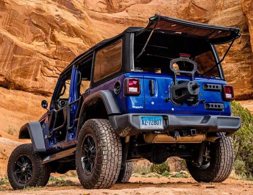 Blue Jeep with EZ Window opened, showcasing quick-access rear window feature for easy cargo loading and ventilation.