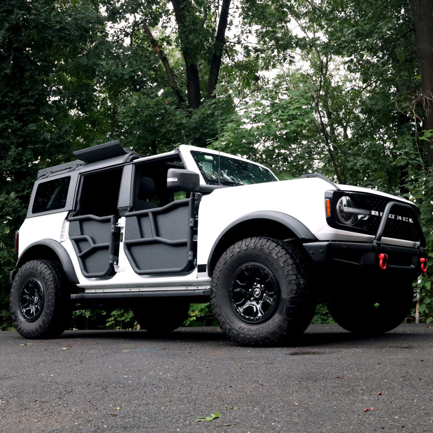 White Ford Bronco equipped with EZ4X4 Alpha Tube Doors and all-weather panels.