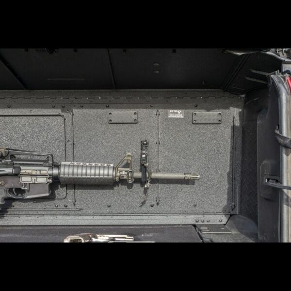 Alternate lose-up of EZ4X4 gun mount securing rifle to EZTrunk, showing durable, safe storage for tactical and outdoor gear.