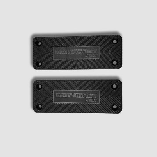 Two black rubber-coated gun magnets, providing a secure hold for firearms with durable, aftermarket magnetic mounting.
