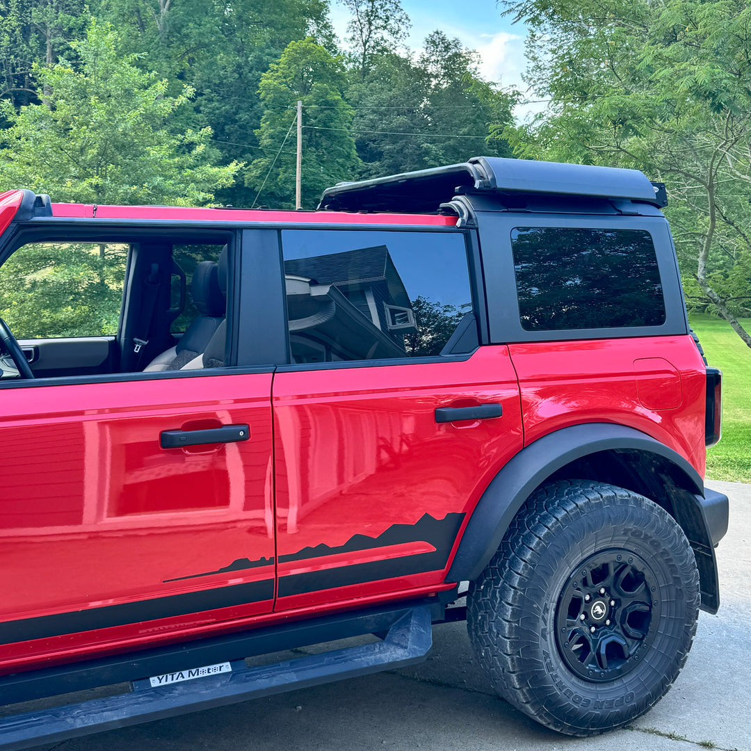 Customer-installed red Ford Bronco with EZ4X4 FlipTop and roof rack, showcasing rugged, functional off-road setup.