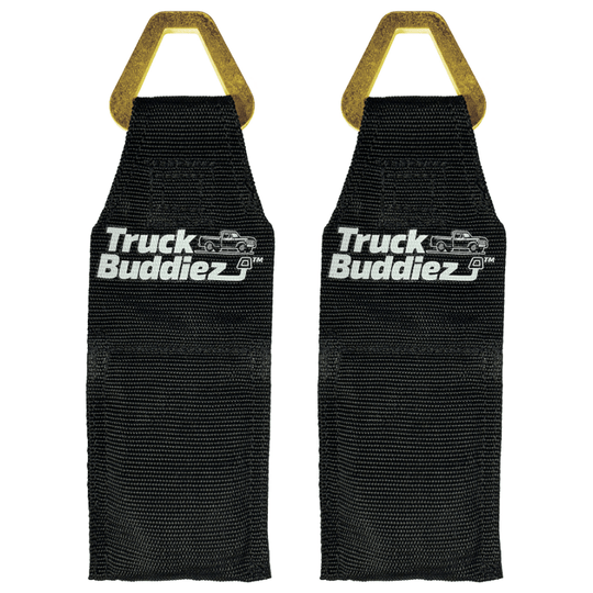 Black Truck Buddiez bed anchor straps shown on white background, highlighting durable design and reliable cargo securing.