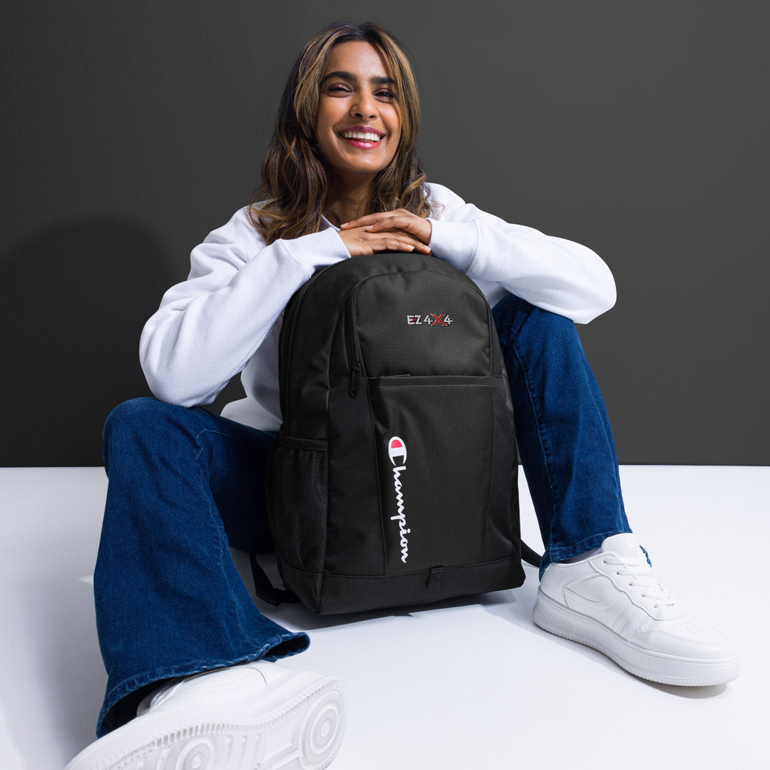 Black EZ4X4-branded EZ Champion Backpack, featuring embroidered logo and athletic design.