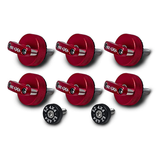 Close-up of six large, red EZ4X4 Quick Release Thumb Screws with integrated D-rings, alongside two smaller, circular thumb screws, isolated on a white background.