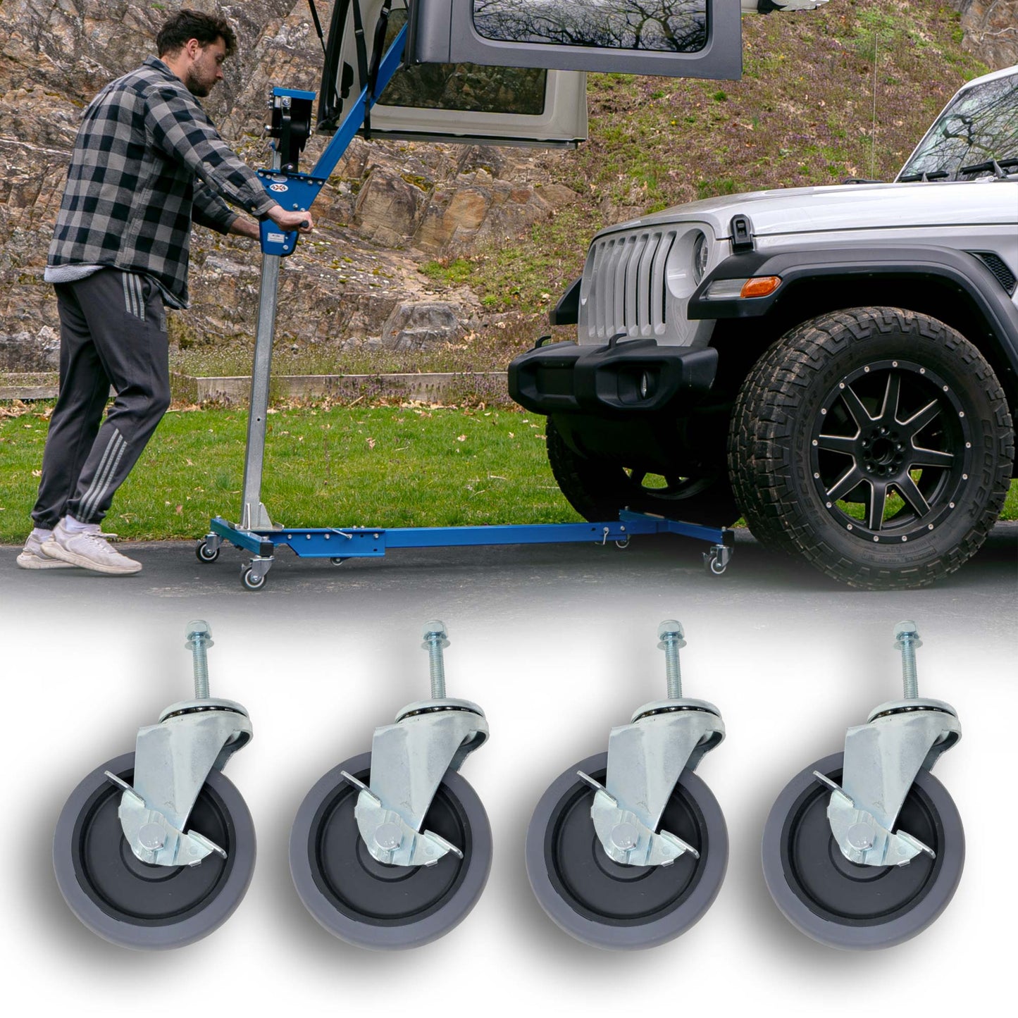 Man rolling EZ4X4 Hard Top Remover Lift with a Jeep hard top lifted, with a set of 4 5-inch caster wheels shown below.
