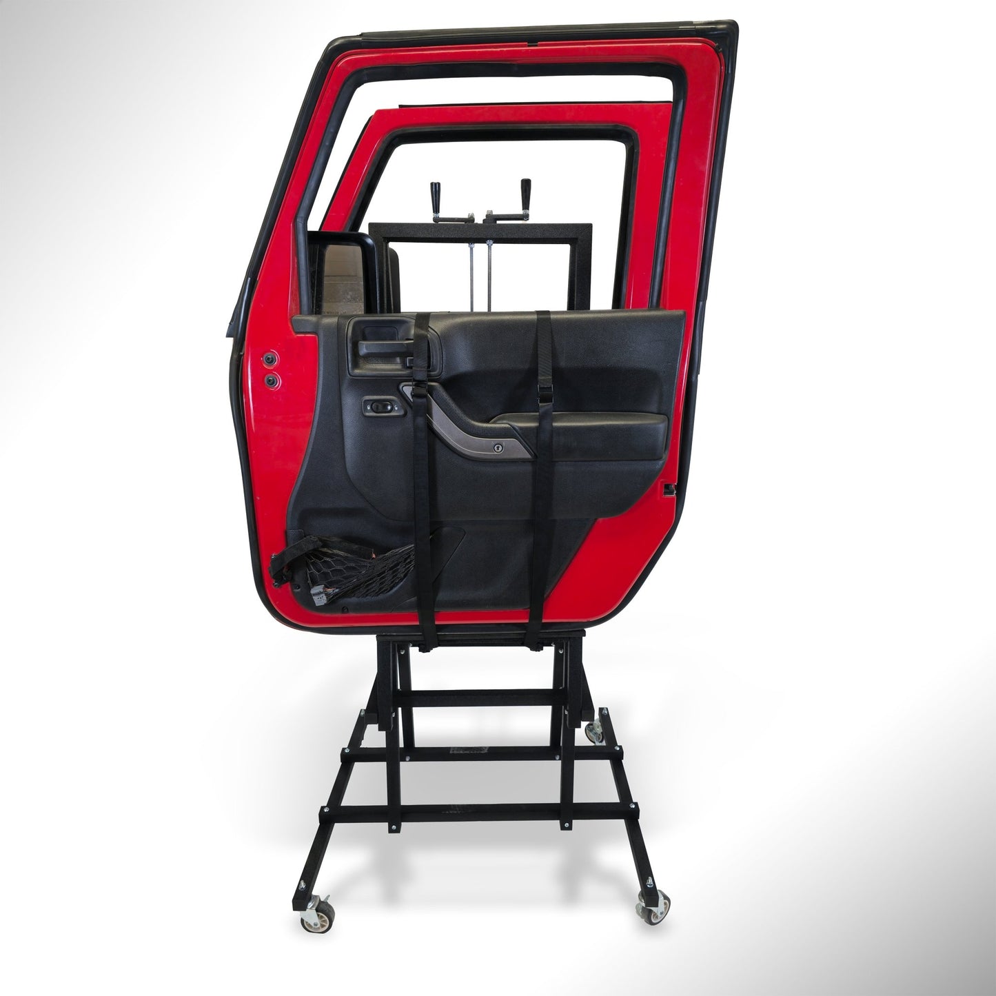 Side view of the EZ4X4 Door Lift securely storing two red Jeep Wrangler front doors on caster wheels for easy mobility and safety.