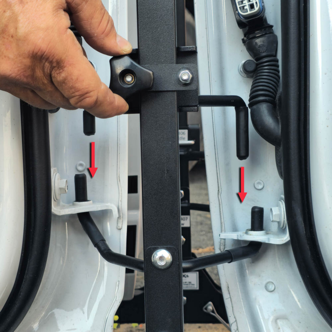 Close-up of Ford Bronco doors being secured onto the EZ4X4 Door Cart using the patented locking pin system.