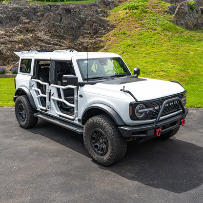 White four-door Ford Bronco with color-matched Alpha Tube Doors.