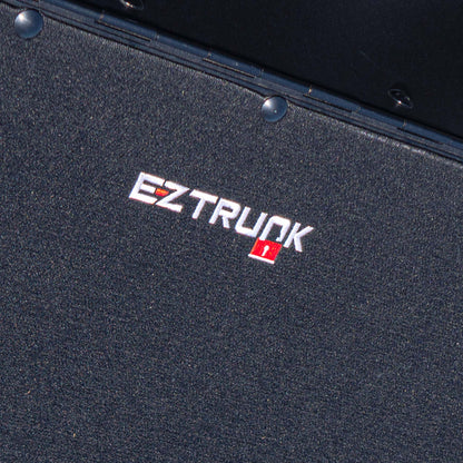 Close-up of custom-fit carpet texture showing dense weave and durable material for vehicle interior protection.