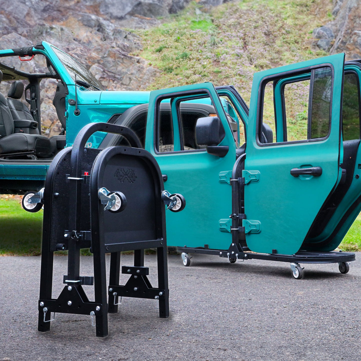 Blue Jeep Wrangler with doors on expanded cart; second cart folded, showing compact, space-saving door storage.