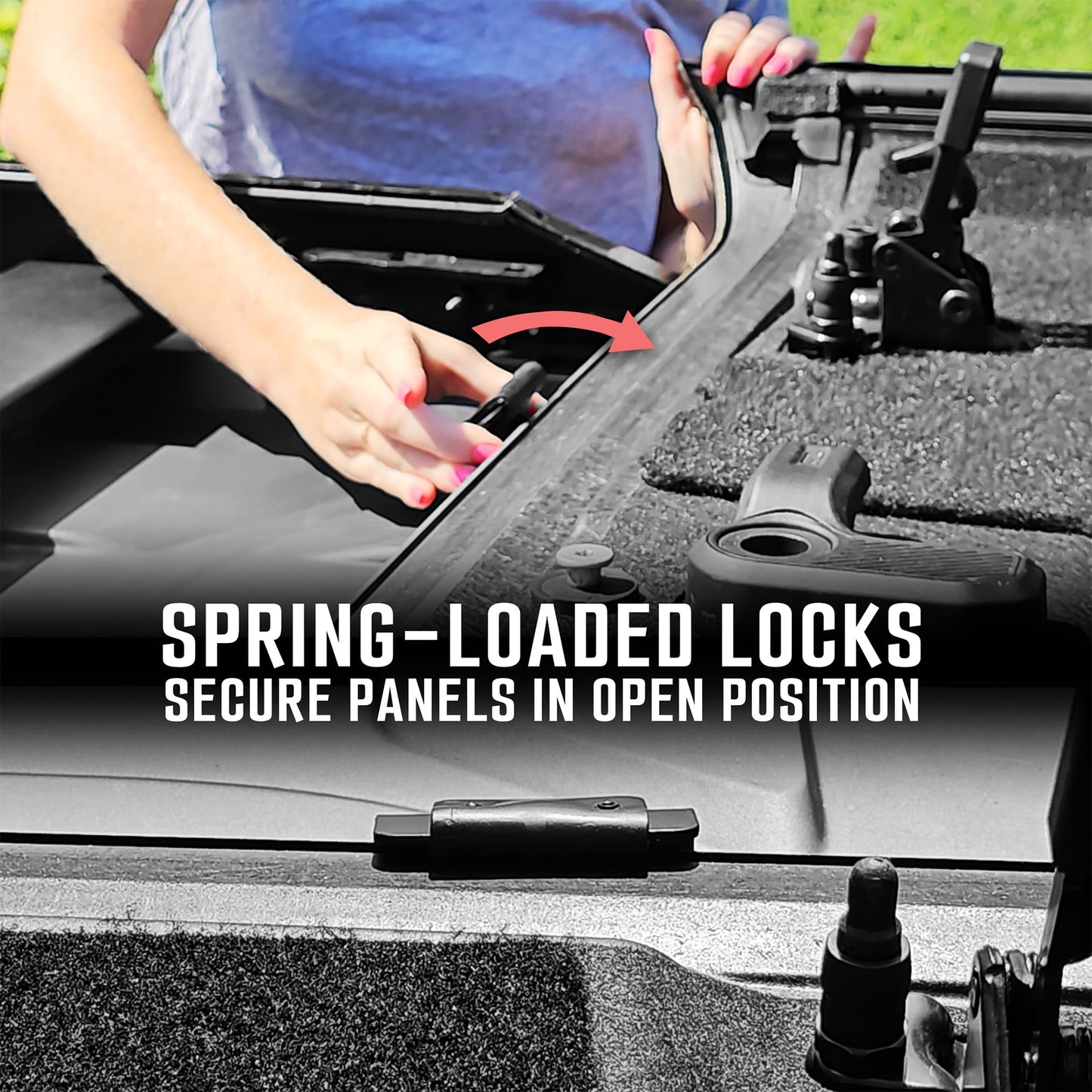 Close-up of spring-loaded locks on aftermarket Ford Bronco roof system, securing flip-up panels for safe, stable access.