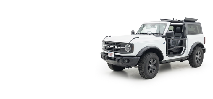 White 2-door Ford Bronco with black EZ4X4 Alpha Tube Doors installed.