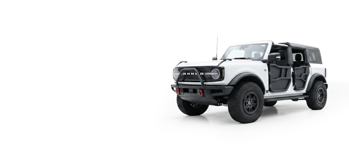 White 4-door Ford Bronco with black EZ4X4 Alpha Tube Doors with All-Weather Panels.