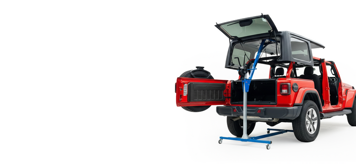 Red Jeep Wrangler hard top being stored using the blue EZ4X4 Hard Top Remover Lift.
