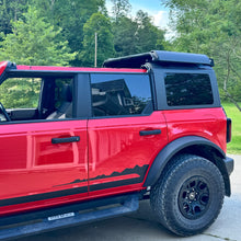 Customer-installed red Ford Bronco with EZ4X4 FlipTop and roof rack, showcasing rugged, functional off-road setup.