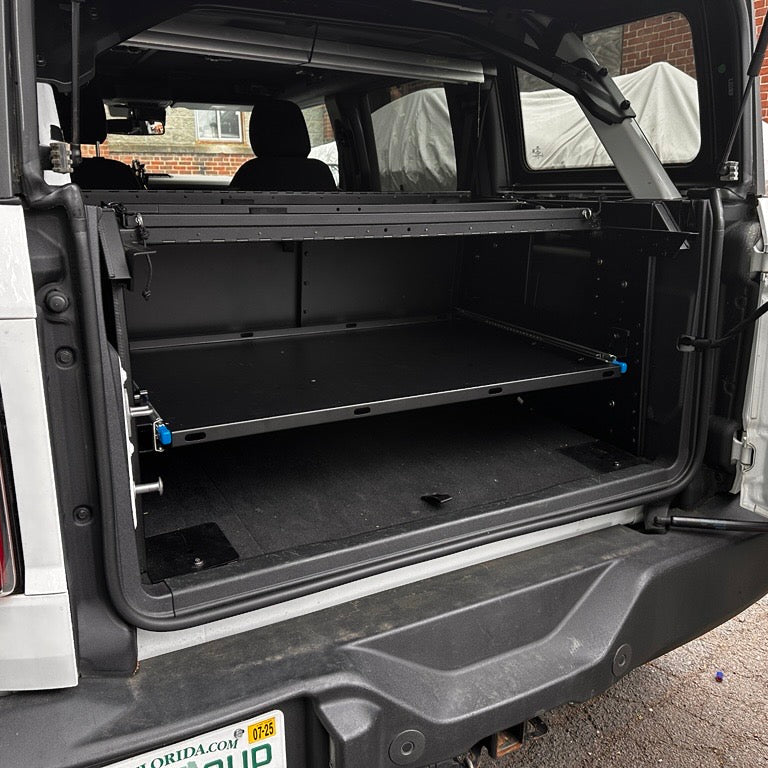 Angled view of the EZ4X4 Extreme EZTRUNK shelf fully retracted and empty.