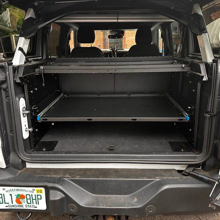 Front view of the EZ4X4 Extreme EZTRUNK with the sliding shelf fully pushed into the trunk.