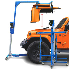 Orange Jeep Gladiator (JT) with its hardtop suspended above it using the EZ4X4 Hard Top Remover Lift, with a second folded lift in the foreground.