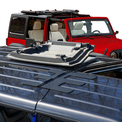 Jeep showing one Freedom Panel open another closed with EZ FlipTop hinges; red Jeep in background with panels flipped up.
