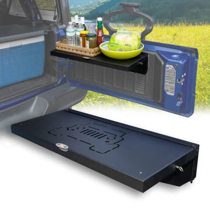Black foldable tailgate table mounted on Jeep and shown solo, highlighting portable, trail-ready gear for camping use.