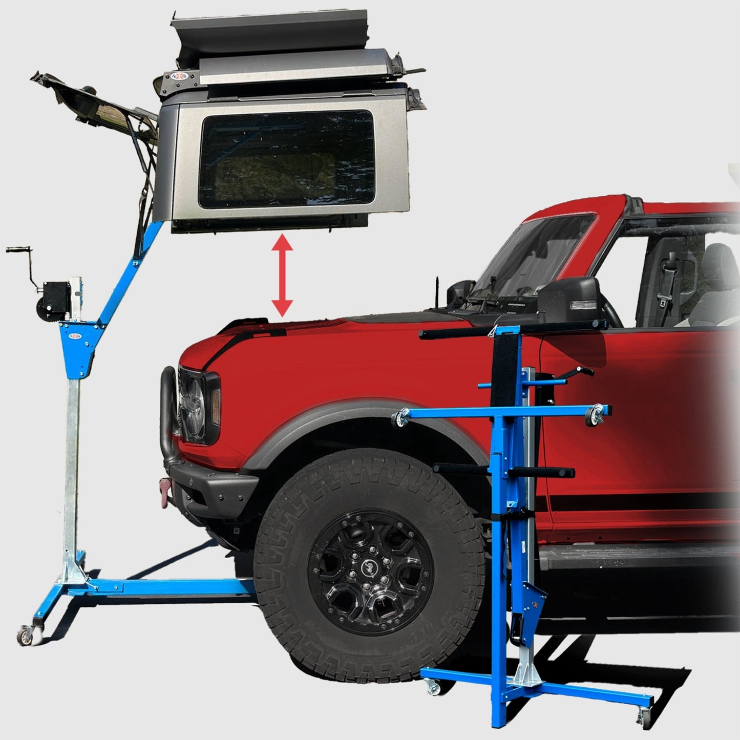 EZ4X4 Hardtop Lift Remover storing a hardtop above a red Ford Bronco, demonstrating safe removal distance.