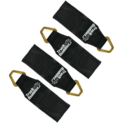 Black Truck Buddiez bed anchor straps shown on white background, highlighting durable design and reliable cargo securing.