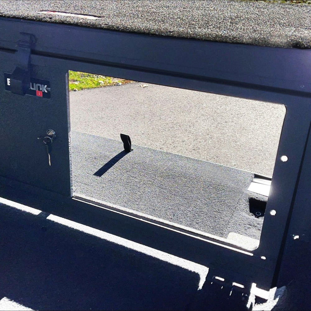 Exterior view of EZTrunk with sliding panel open, highlighting easy access, secure cargo storage, and rugged modular design.