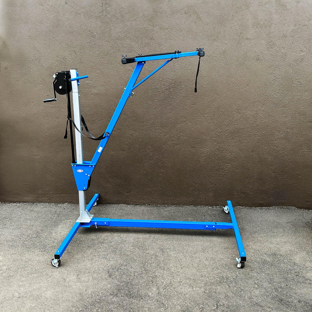 EZ4x4 blue steel hardtop lift fully extended without top, showing max height and structure for Jeep and Bronco roof removal.
