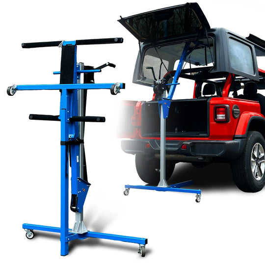EZ4x4 blue steel hardtop lift compact in front, holding Jeep hardtop above red Jeep Wrangler for secure storage.