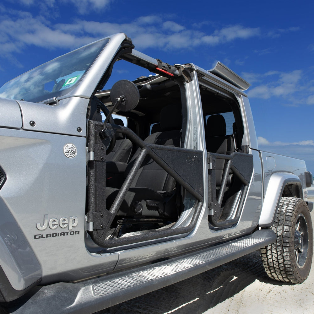Gray Jeep Gladiator with EZ4X4 black Phantom doors parked at the beach, showcasing rugged, open-air off-road style.