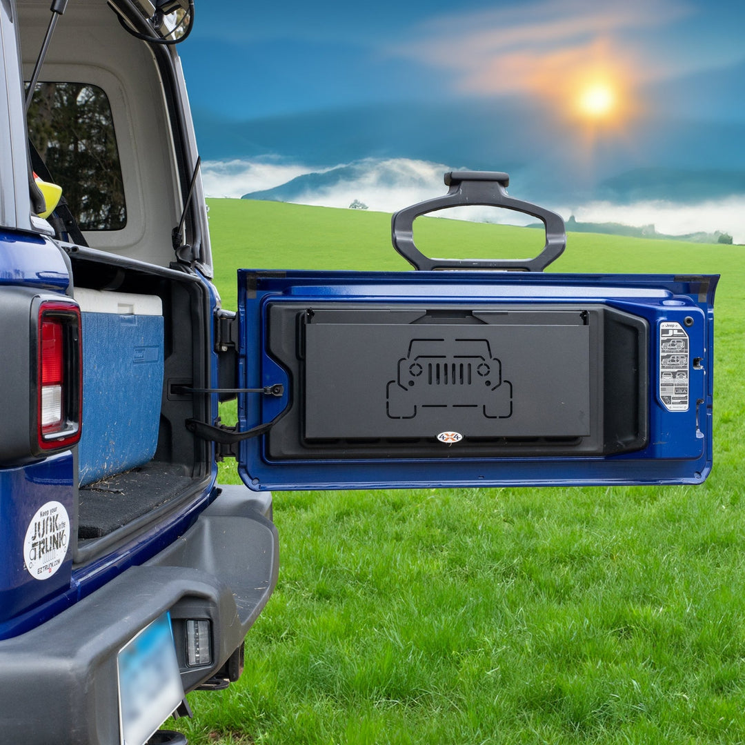 Extreme Folding Tailgate in blue Jeep folded up compactly, showing space-saving design for efficient storage.