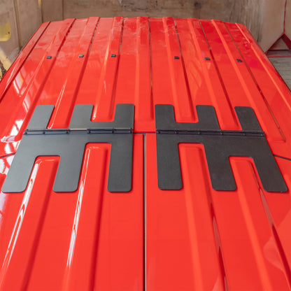 Overview of EZ FlipTop hinges with Freedom Panels closed on Jeep Gladiator, showing low-profile design and secure fitment.