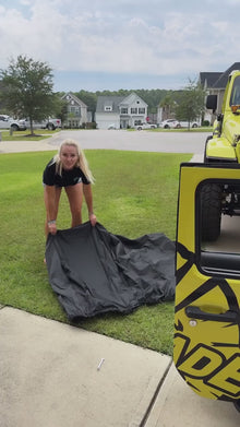 Video of someone putting on the EZ4X4 Door Cart Cover.