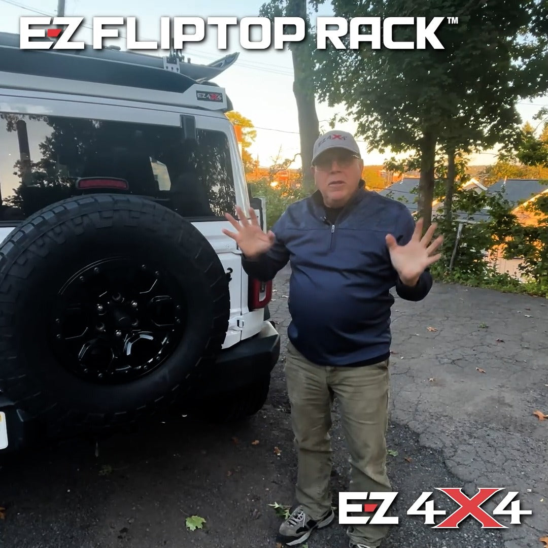 Video of a man demonstrating the EZ FlipTop and middle panel roof rack holder on a four-door Ford Bronco.