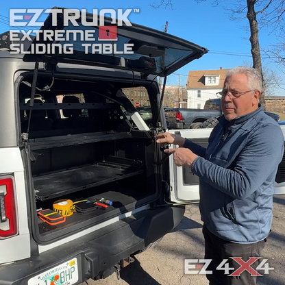 EZ4X4 Extreme EZTRUNK Sliding Tray product overview on white Jeep Wrangler.