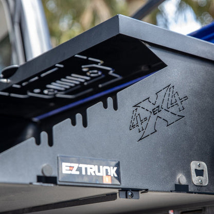 Close-up of EZ4X4 branding detail on Extreme Folding Tailgate Table, highlighting quality craftsmanship and design.