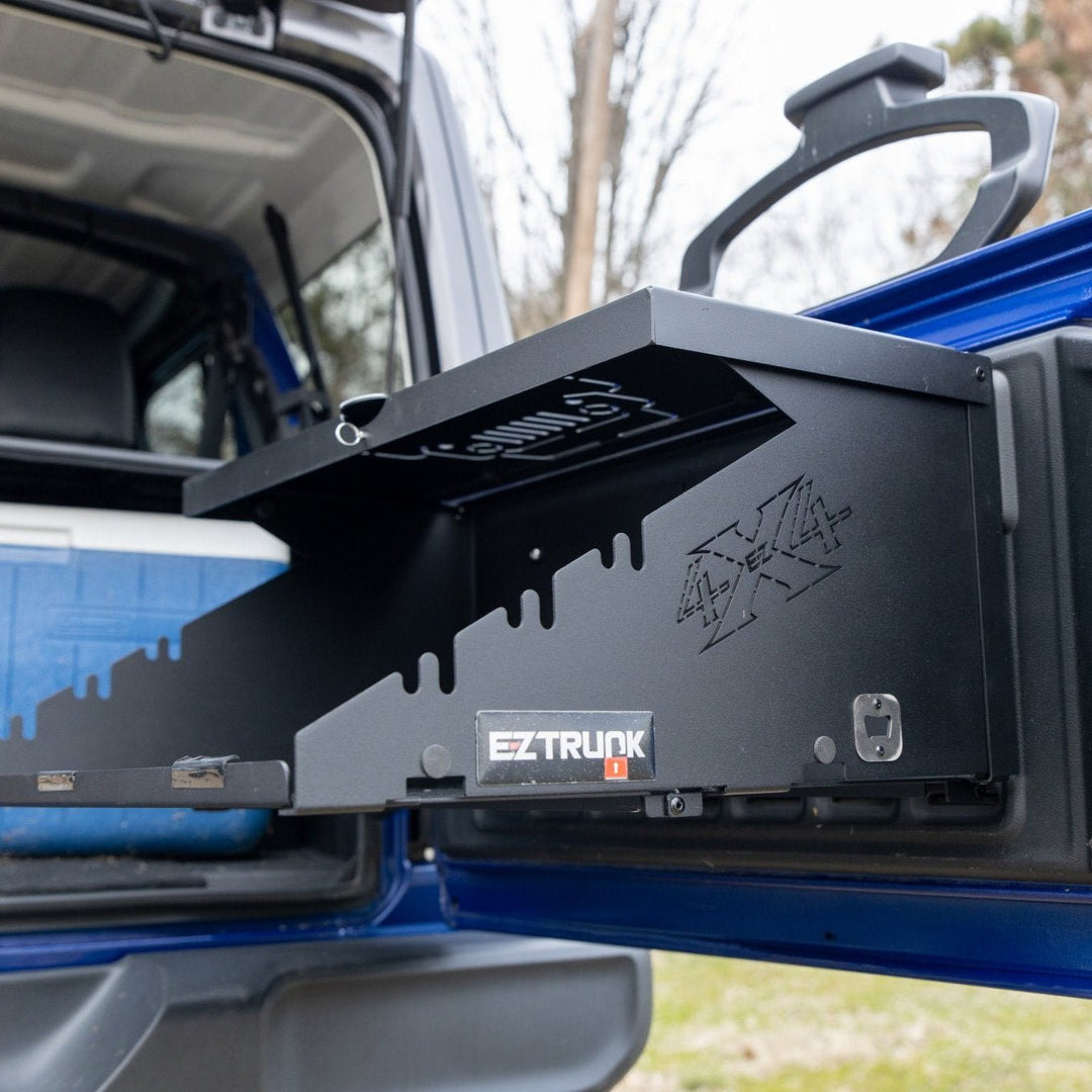 Side view of EZ4X4 branding detail on Extreme Folding Tailgate Table, highlighting quality craftsmanship and design.
