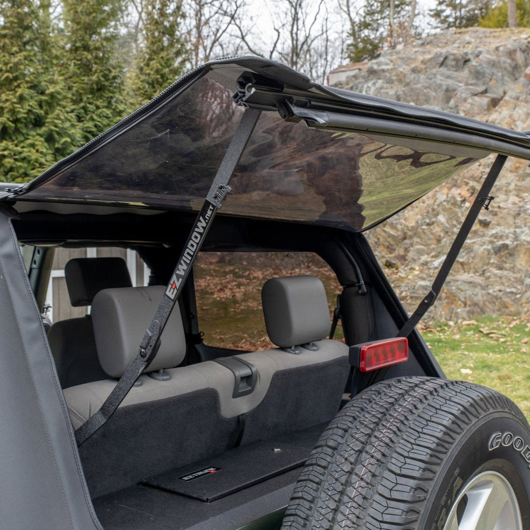 Closer view of EZWindow slanted for soft-top Jeep Wranglers, showing improved ventilation and rear access.
