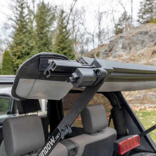 Close-up showing how EZWindow attaches and stabilizes soft-top frame, providing secure fit and added support.